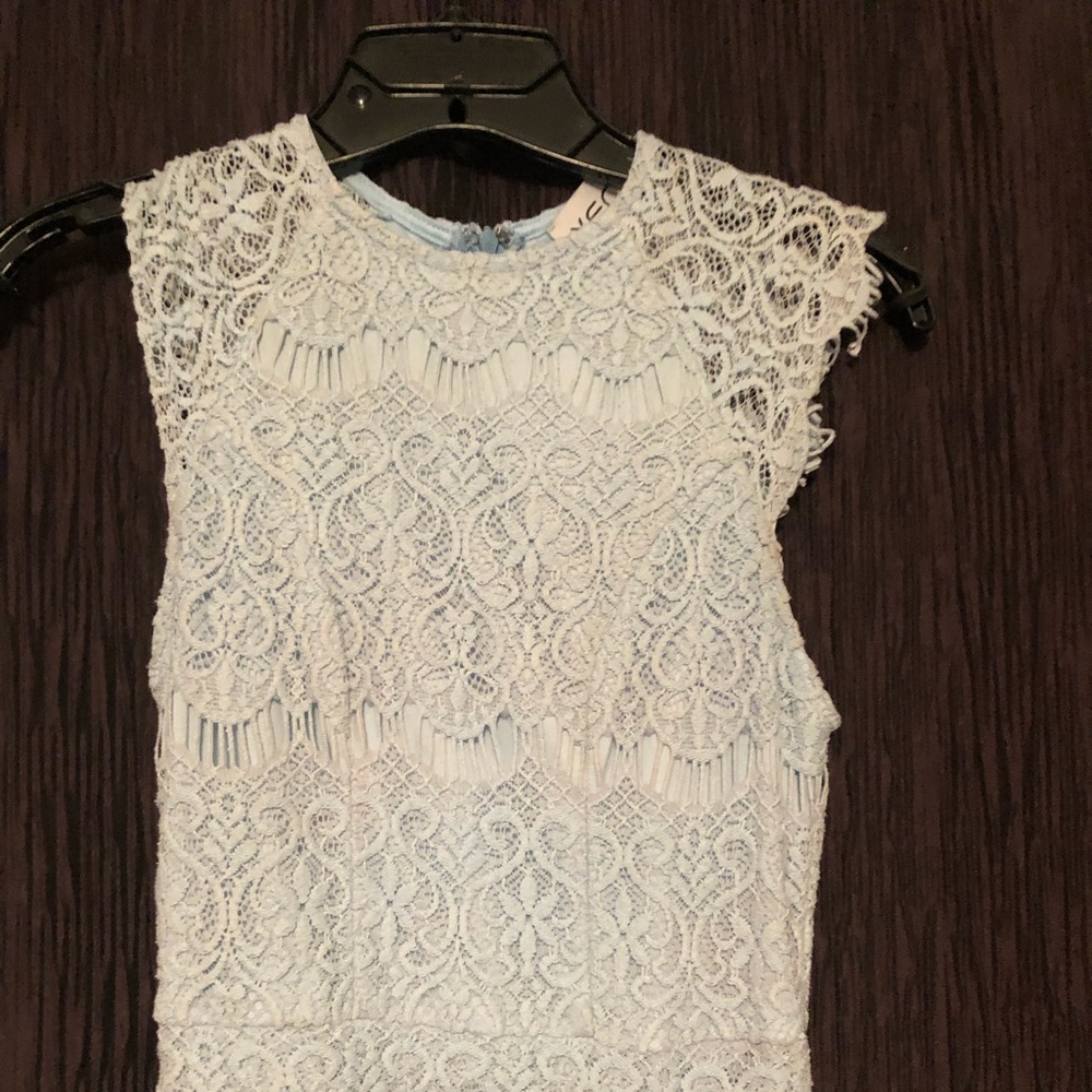 Xenia Boutique Fitted Mini Dress